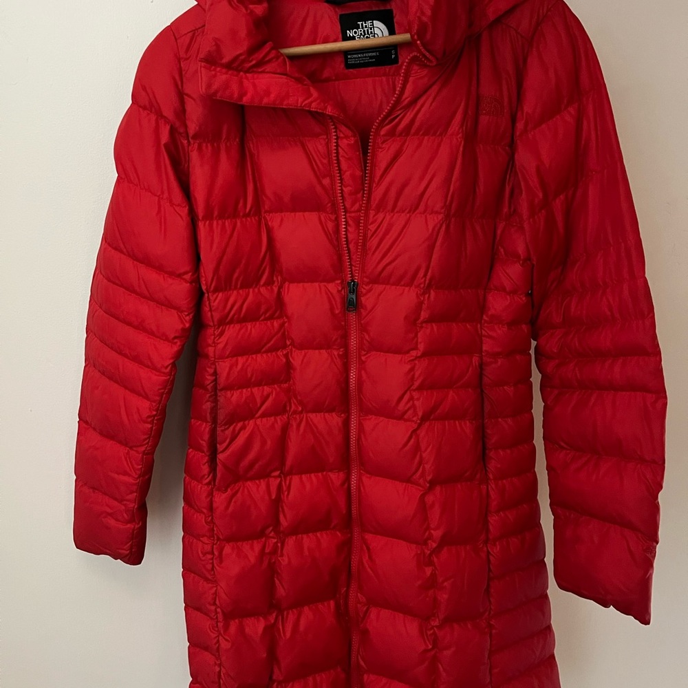 Bright red Northface puffer jacket. Perfect for winter and freezing temps